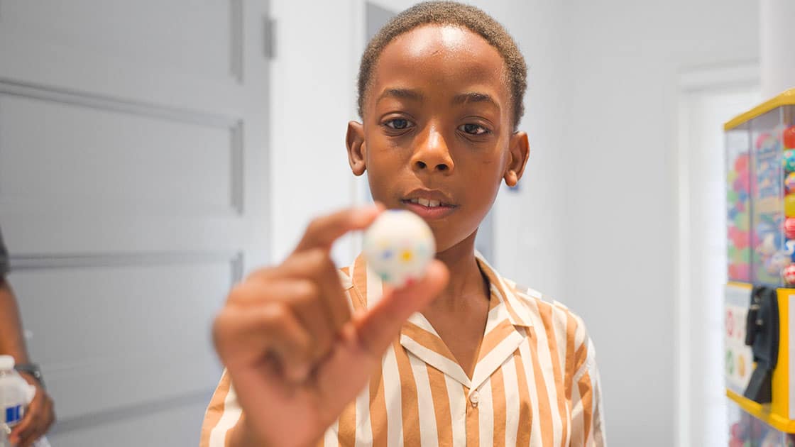 Boy holding Ball